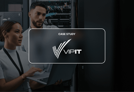 The VIP IT logo is superimposed over two sysadmins looking at a laptop screen. 